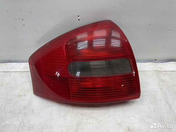 Фонарь левый Audi A6 C5 седан(дефект)