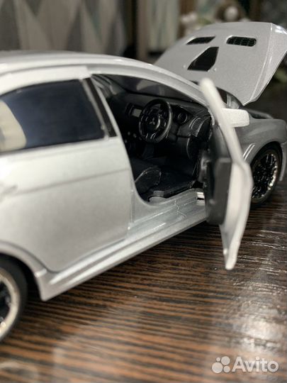 Коллекционная машинка Mitsubishi evolution lancer
