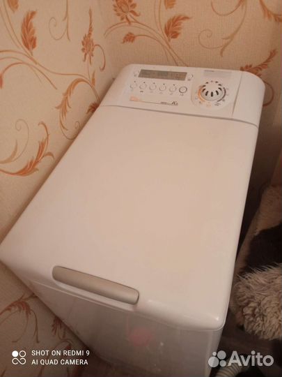 Стиральная машина с вертикальной загрузкой