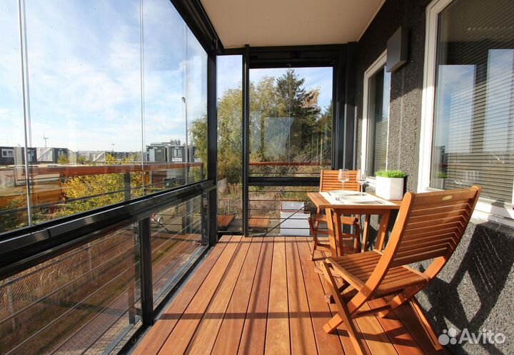 Пластиковые балконы с панорамным остеклением