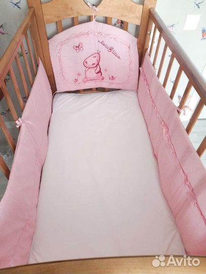 Бортик на кроватку розовый