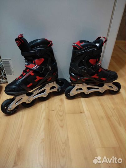 Роликовые коньки