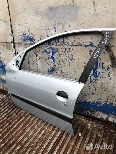 Дверь передняя левая Peugeot 206
