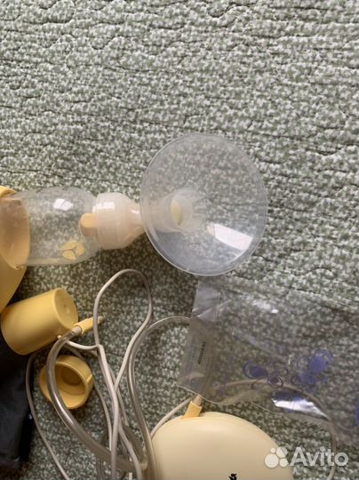 Молокоотсос medela электрический