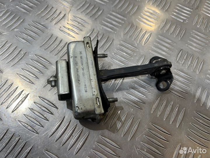 Ограничитель двери передний левый Ford Transit 2.4