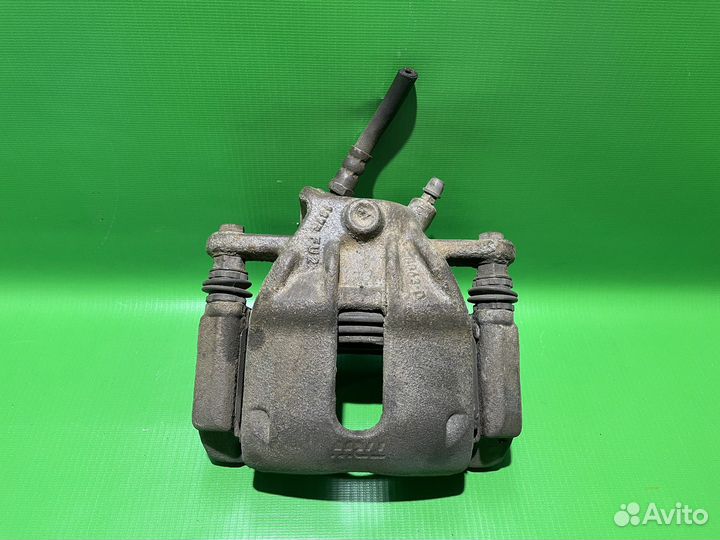 Суппорт передний левый Nissan Almera G15