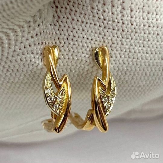 Золотые серьги с камнем