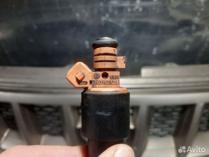 Форсунка топливная Kia Sportage 1 2.0 FE 16V