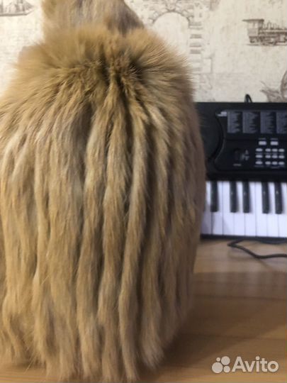 Шапка из вязанной норки с помпоном