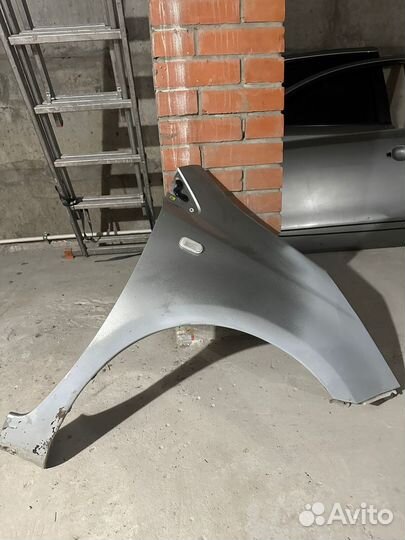 Nissan note крыло переднее правое