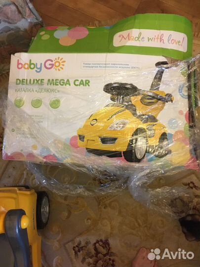 Детская машинка каталка музыкальная