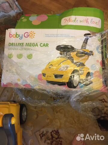 Детская машинка каталка музыкальная
