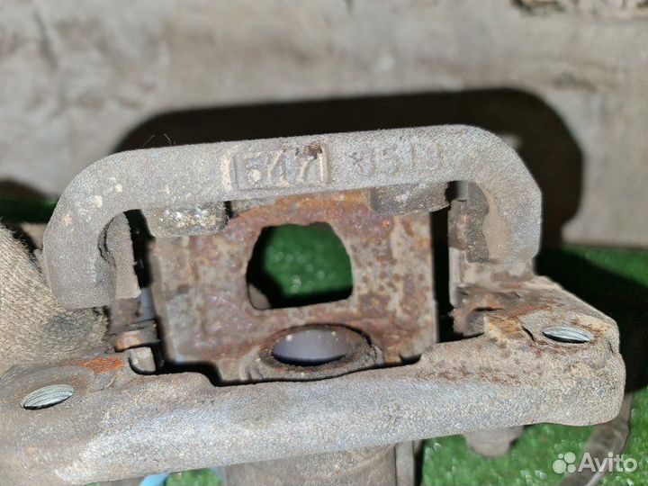 Суппорт тормозной задний правый Nissan Teana J31