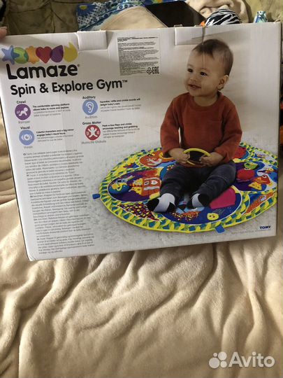 Игрушка Lamaze Коврик Крутись и Развивайся