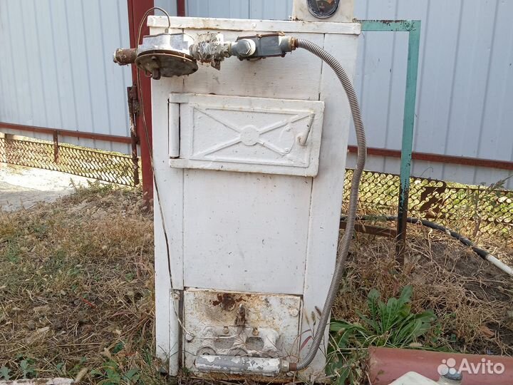 Котёл, может работать на газу и твёрдом топливе