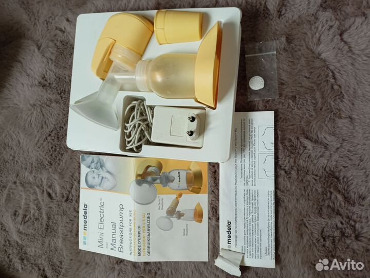 Молокоотсос medela mini electric