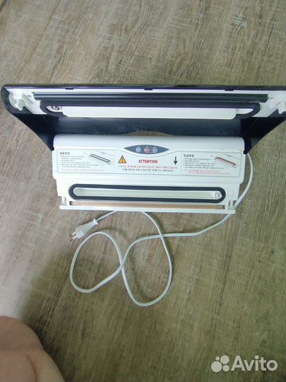 Вакуумный упаковщик продуктов