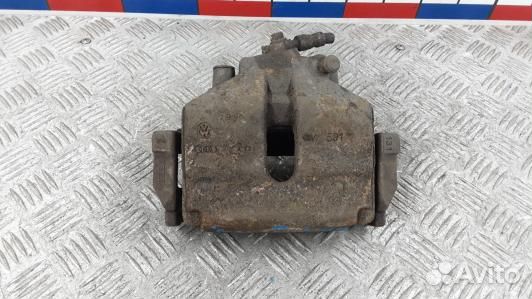 Суппорт тормозной передний левый volkswagen passat