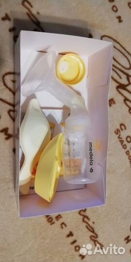 Молокоотсос medela ручной