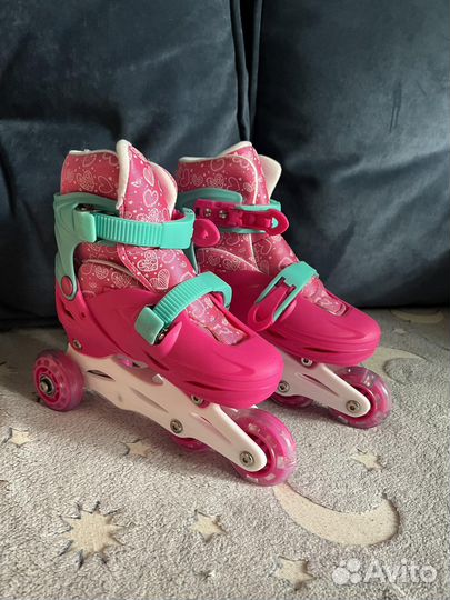 Роликовые коньки