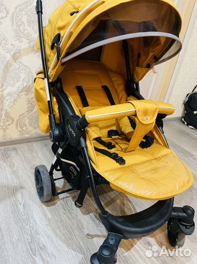 Прогулочная коляска с перекидной ручкой