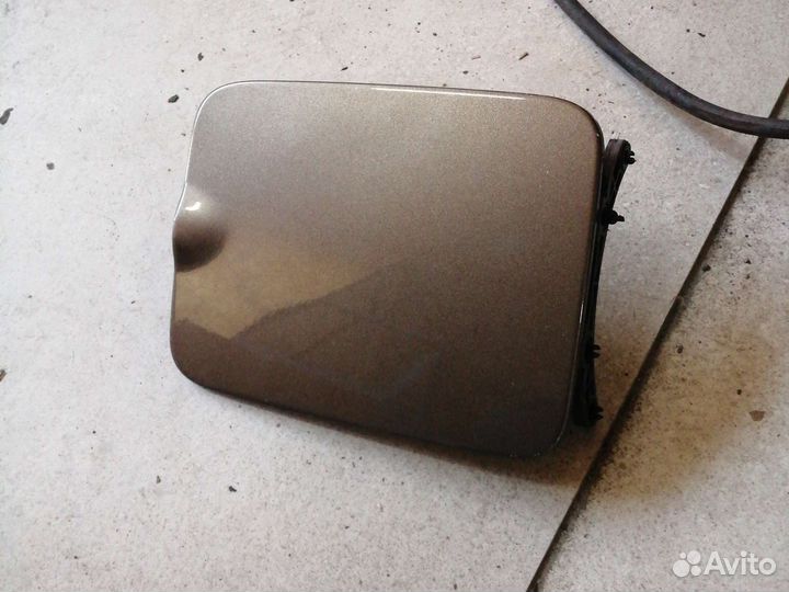 Лючок бензобака на Volvo XC90