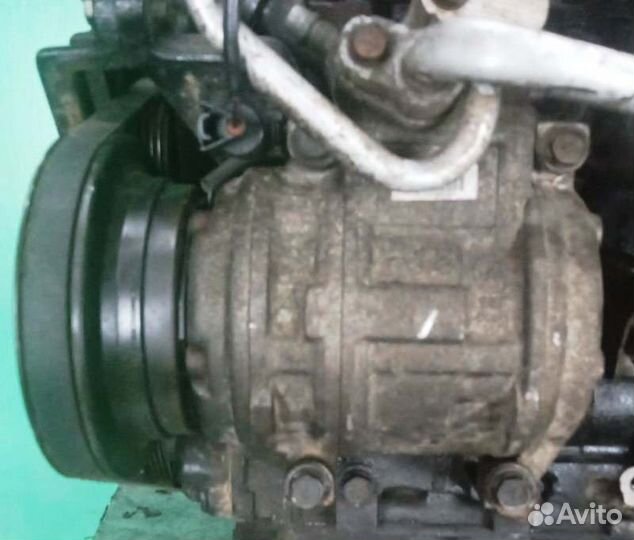 Компрессор кондиционера Mitsubishi Chariot N33W