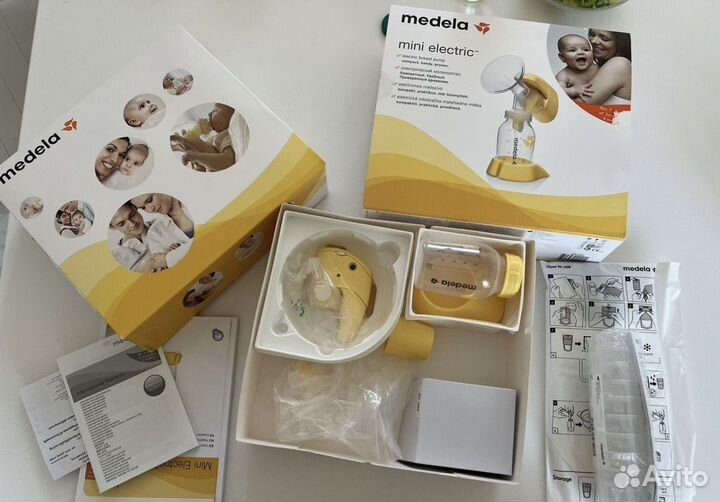 Молокоотсос medela электрический