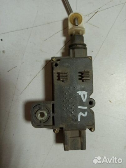 Активатор замка багажника Nissan Primera P12E