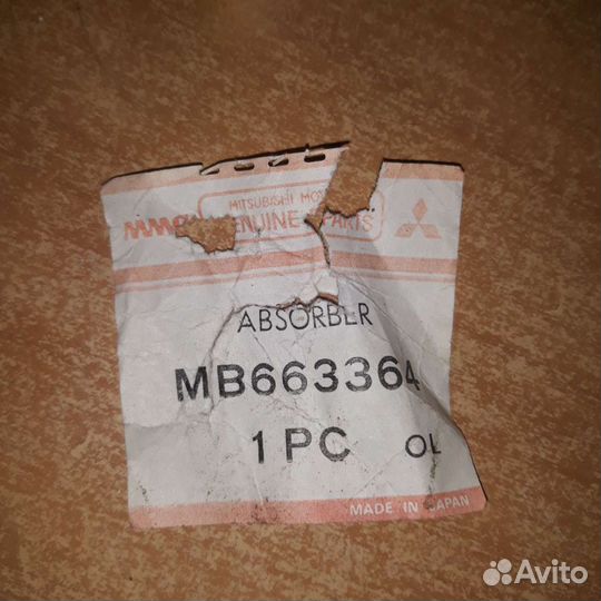 Задний амортизатор Mitsubishi Pojero