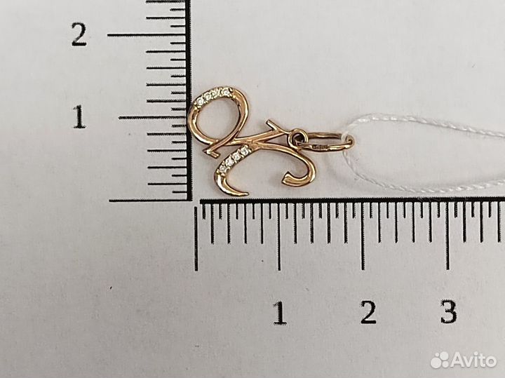 Золотая подвеска с камнем