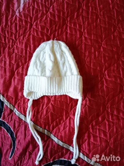 Вязаный комбинезон для новорожденного