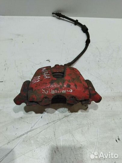 Суппорта передние Mazda 3 2004