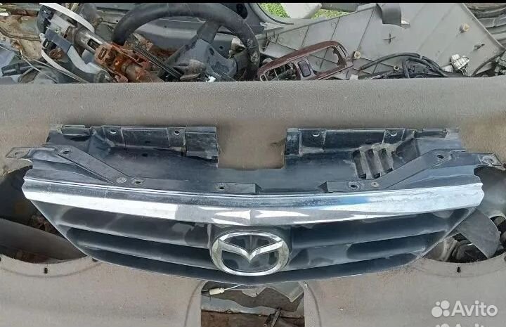Mazda capella 2000 г решотка радиатора