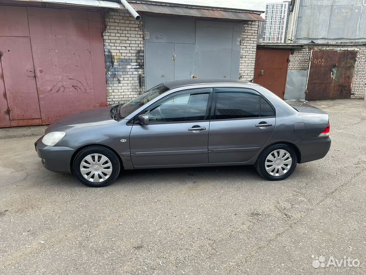 Mitsubishi Lancer 1.6 МТ, 2006, 240 000 км