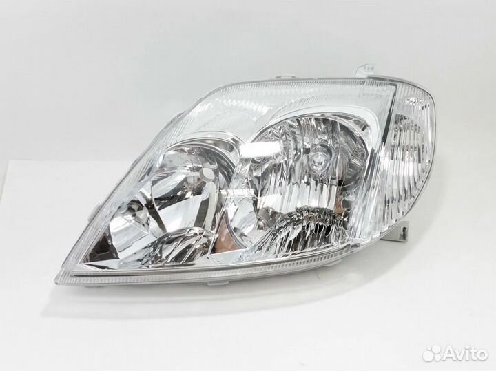 Фара левая Toyota Corolla E120 седан (2002-2004)