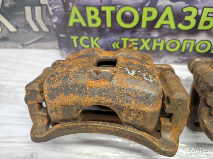 Суппорт передний Nissan Almera N15