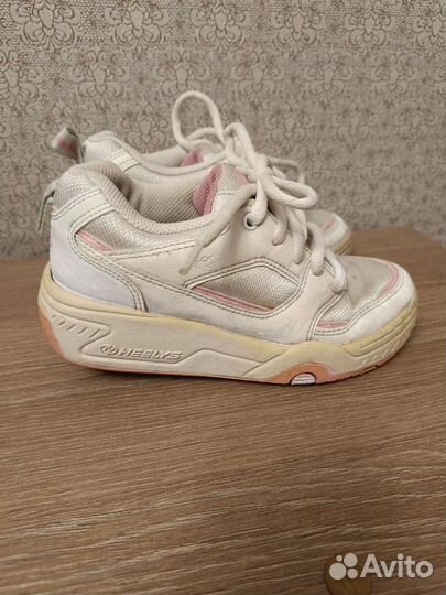 Кроссовки роликовые