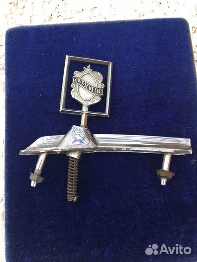 Олдсмобил значек