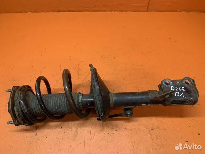 Стойка амортизатора передняя левая Toyota