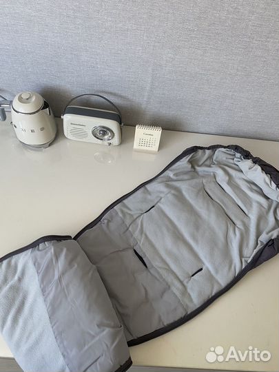 Зимний конверт в коляску mansita