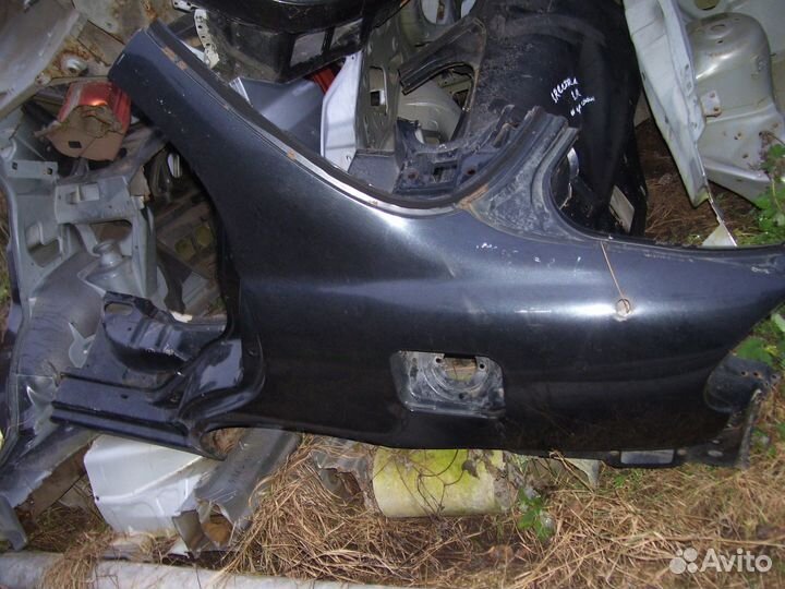 Киа спектра крыло заднее