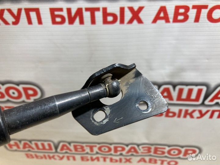 Амортизатор крышки багажника левый Nissan