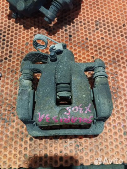 Суппорт тормозной задний левый Hyundai Solaris