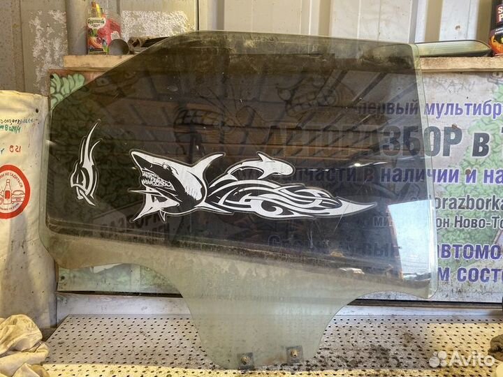 Стекло двери заднее правое Renault Logan