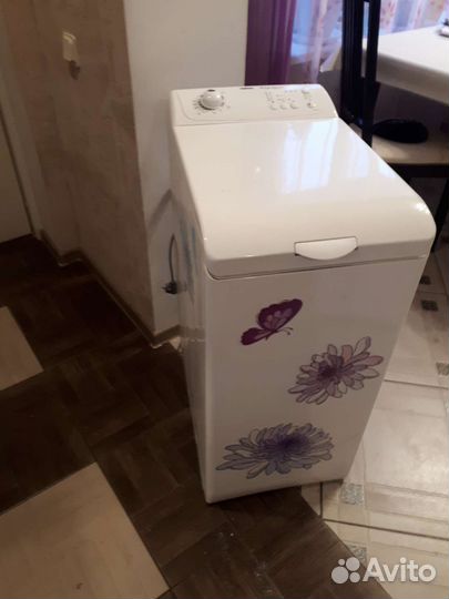 Стиральная машина с вертикальной загрузкой Zanussi