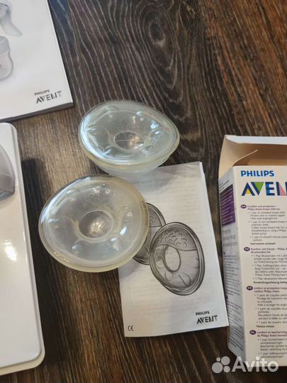 Молокоотсос avent ручной+пакеты+накладки для молок
