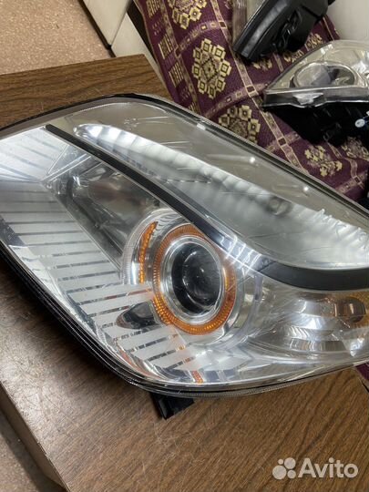 Фара левая Geely MK Cross 11-16г