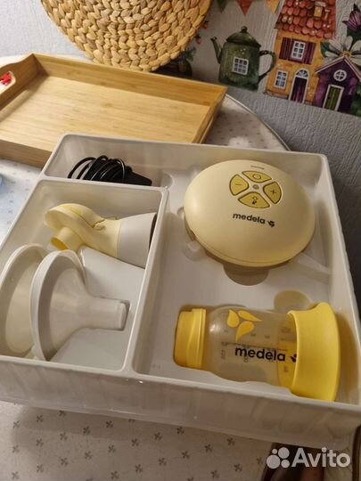 Молокоотсос medela swing flex электрический