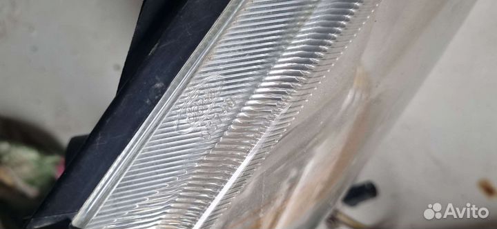 Стекло правой фары на ford focus 2 дорест